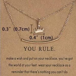 Women's charm crown pendant necklace.